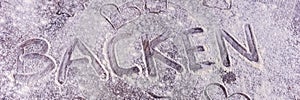 Baking Backen in German letters written in flour