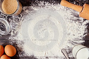 Baking background. Baking ingredients on the wooden table