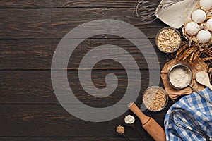 Baking background with eggs and flour on rustic wood