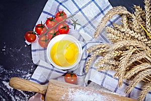 Baking background with eggshell, flour and rolling pin. Pizza co