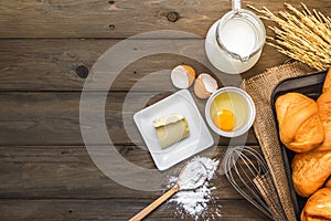 Baking background with raw eggs, butter and flour
