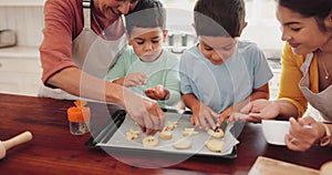 Baking, biscuits and kids with grandmother and mother in kitchen for sweet treats, dessert or snack. Sprinkles, teaching
