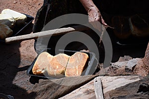 Baking bread using an horno or Spanish oven photo
