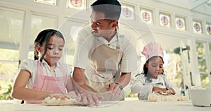 Baking, dough and a dad teaching his girls about cooking in the kitchen of their home together. Pastry, children or