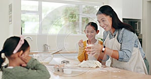 Baking, family help and learning of kids with mother showing cookie dough roll in a kitchen. Home, support and mama with