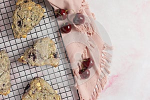 Baking fresh cherry scones on a cooling rack