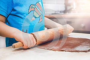 Baking gingerbreads. The family is preparing a gingerbread.