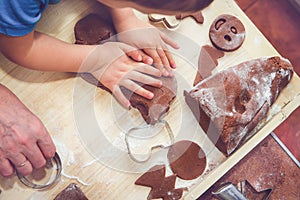 Baking gingerbreads. The family is preparing a gingerbread.