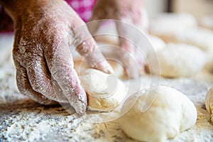 Baking at home. Homemade cakes dough in the women's hands. Process of making pies, hand. Hands pie dough. Cooks