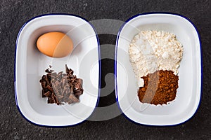 Baking ingredients for chocolate cake in a mug