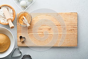 Baking ingredients and kitchen utensils on a white background top view. Preparing heart sugar cookies. Baking background. Flour,