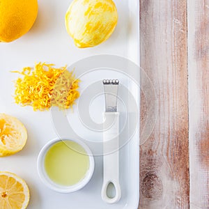 Baking ingredients for a lemon cake - whole lemon and lemon rind