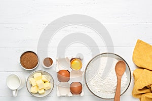 Baking ingredients on white wooden table