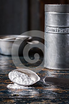 Baking Powder Spilled from a Teaspoon