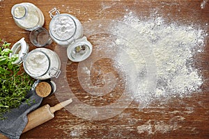 Baking scene atmospheric kitchen scene flour on wooden table