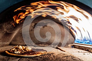 Baking and serving pitta brad, pizza and fresh bread