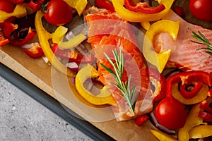 Baking sheet with Arctic char and vegetables