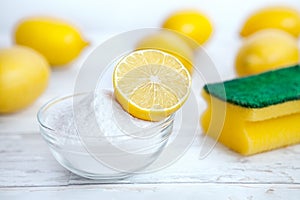 Baking soda in bowl with lemon