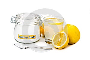 Baking soda with lemon juice in glass for multiple holistic usag