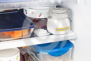 Baking soda placed in refrigerator to deodorize bad odor.