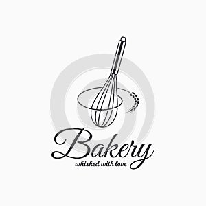Baking with wire whisk logo. Bakery concept photo