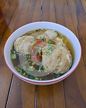 bakso. indonesian beef meatball served with noodle and tofu