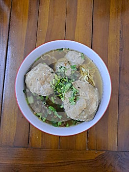 bakso. indonesian beef meatball served with noodle and tofu