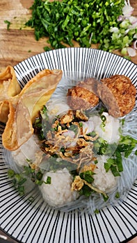 BAKSO is Indonesian food made from chicken or beef, soupy and savory photo