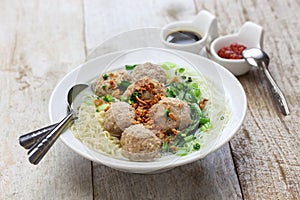 Bakso, indonesian meatball soup with noodles photo