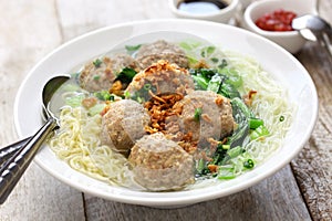 Bakso, indonesian meatball soup with noodles photo