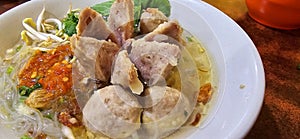 Bakso, indonesian meatball style served with beef broth soup and noodle springkled with fried onion and spring onion coupled with