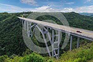 The Bakunagua Bridge is one of Cuba`s attractions. The bridge`s altitude is 110 meters, and its length is 103 meters.