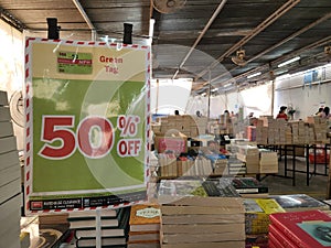 Balakong, Malaysia - May 30, 2022 : MPH warehouse clearance sale. Books on the table.