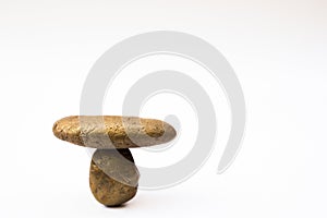 Balance different stone concepts together on white background