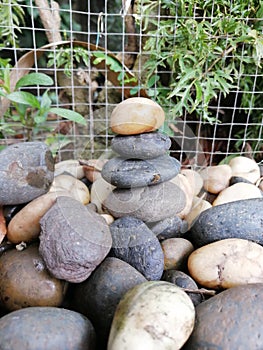 Balance gray and white pebbles in the garden