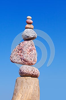 Balance and poise stones. Rock zen on the background of blue sky