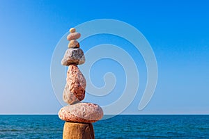 Balance and poise stones. Rock zen on the background of blue sky