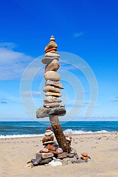 Balance and poise stones. Rock zen on the background of blue sky and sea