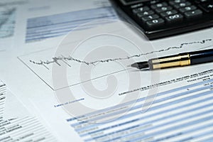 Balance sheet ,pencil, calculator on accountant`s desk. Accounting , accounts concept