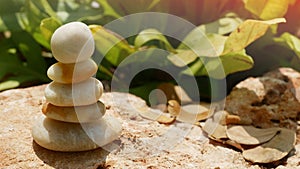 The Balance Stones are stacked as pyramids in a soft natural bokeh background, representing the calm philosophical concept of