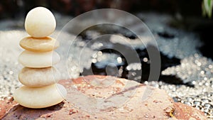 The Balance Stones are stacked as pyramids in a soft natural bokeh background, representing the calm philosophical concept of