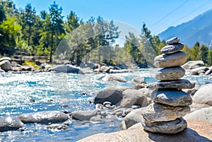 Balance and wellness retro spa concept, inspiration, zen-like and wellbeing tranquil composition. Close-up of white pebbles stack