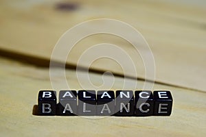 Balance written on wooden blocks