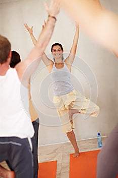 Balance, yoga and people with personal trainer for class stretching, exercise and workout on mat. Pilates, health club