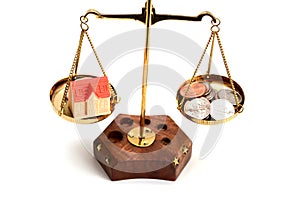 Balance your life concept with scale weighting money and family life isolate on white background