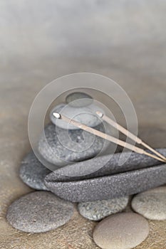 Balanced Pebble Stack On Wood