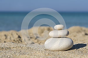 Balanced pebbles on a the beach, close up