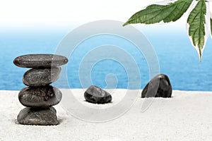 Balanced stone pile on beach