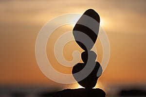 Balanced stones on the beach