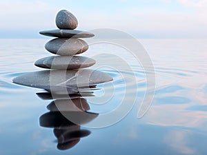 Balanced Zen stones in water